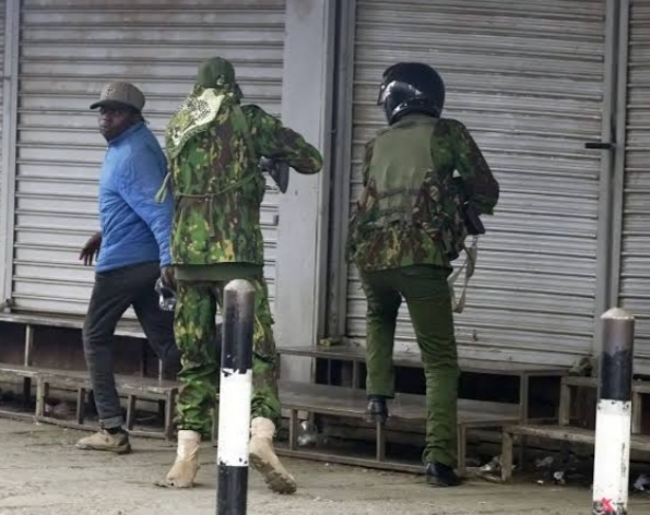 TWO POLICE OFFICERS WHO SHOT MASK VENDOR BONIFACE KARIUKI AT CLOSE RANGE CAUGHT