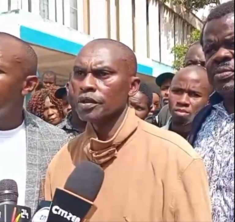 SHOT MASK VENDOR'S FATHER SPEAKS